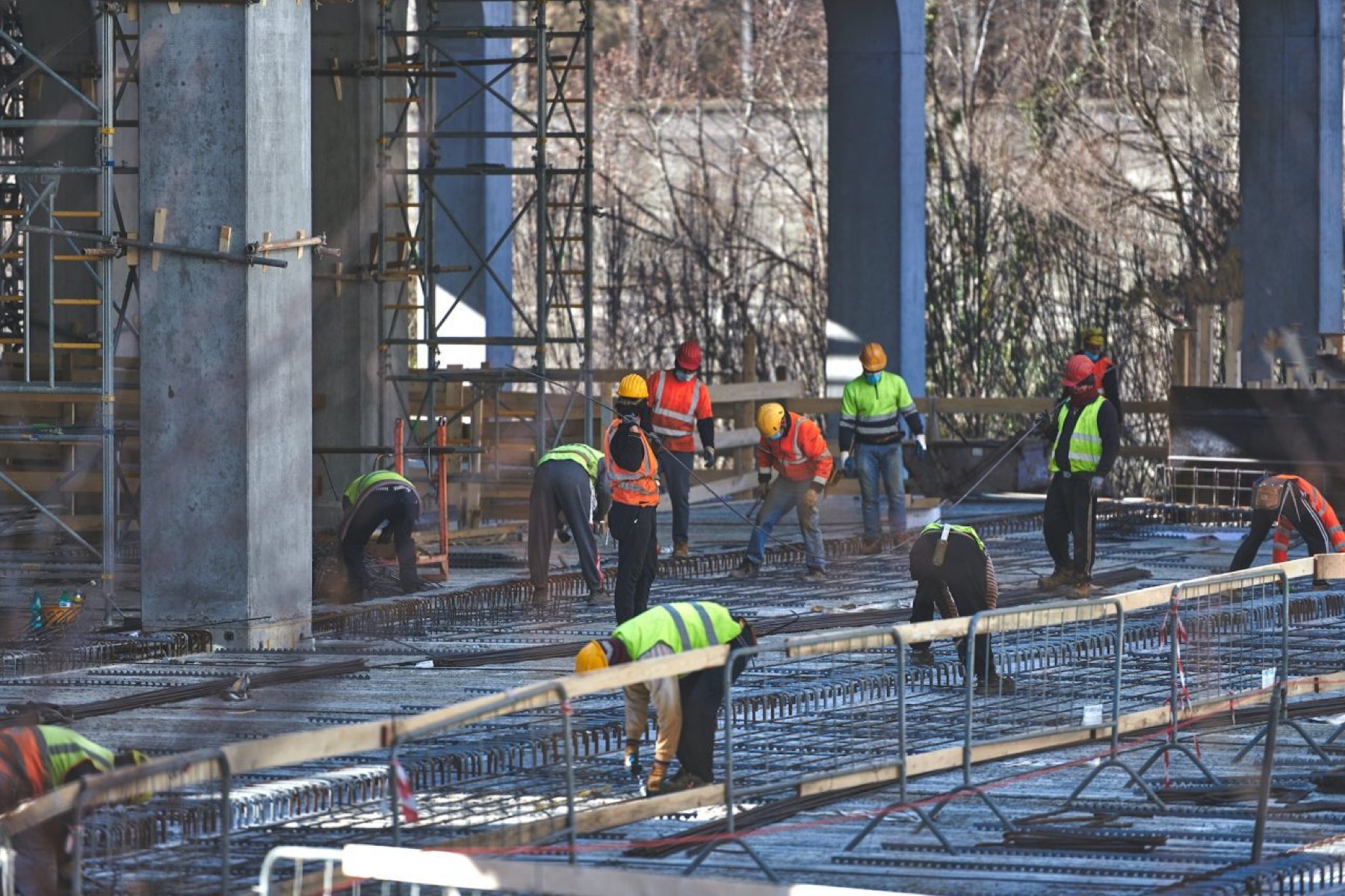 Construction team working on reinforced concrete